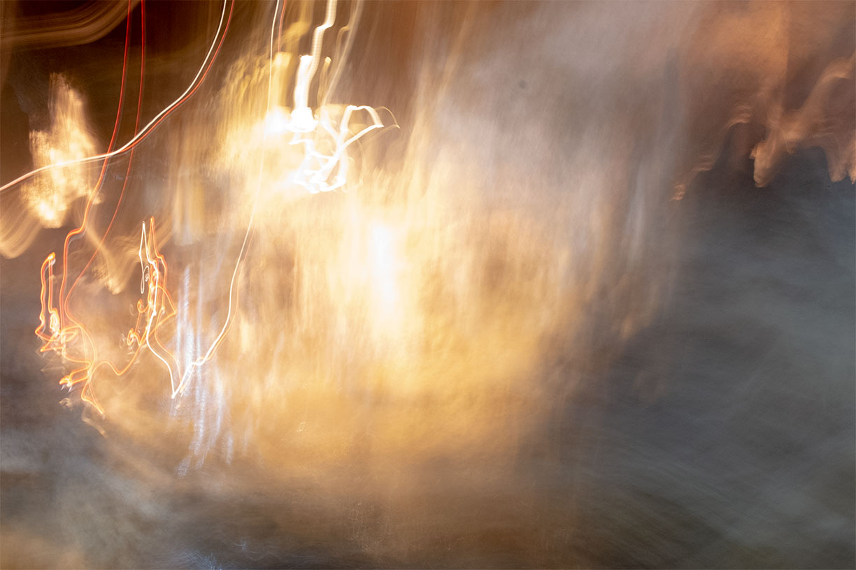 Abstract photo - streaks of bright orange, white and red